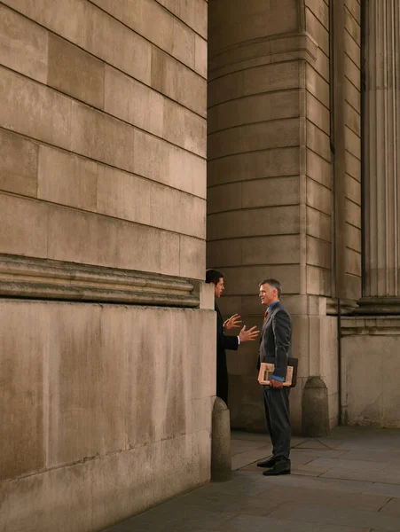 Two Businessmen Talking Entrance Monumental Building — Stock Photo, Image