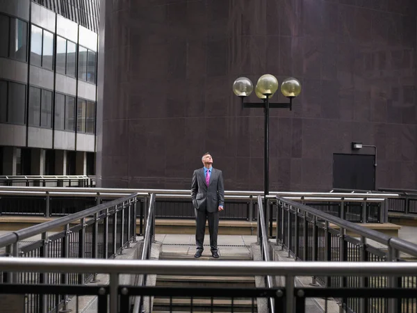 Man Standing Top Steps Looking — Stock Photo, Image