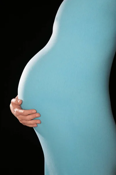 Pregnant Woman Body Suit Holding Abdomen Mid Section Side View — Stock Photo, Image