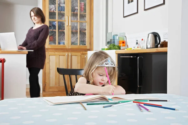 Girl Drawing Book Mother Using Laptop Background — Stock Photo, Image