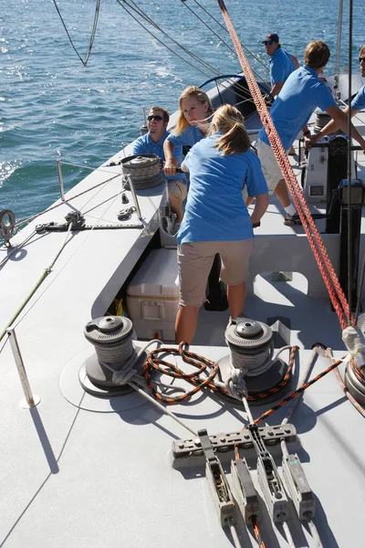 Sailing team on yacht