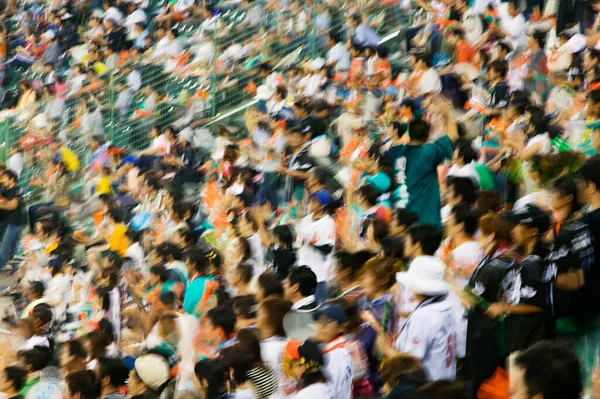 Japan Kobe Yahoo Stadium crowd of people watching baseball match motion blur