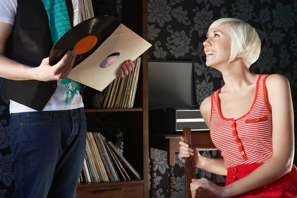 Young Woman Looking Man Holding Vinyl Record Room — Stock Photo, Image