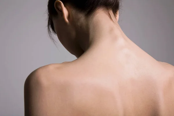 Back view of young woman\'s back