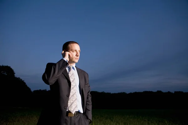 Business Man Using Mobile Phone Field — Stock Photo, Image