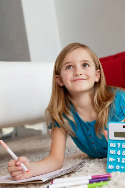 Happy Young Elementary Aged Girl Doing Homework — Stock Photo, Image