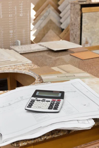 Calculator on paper in tiles store