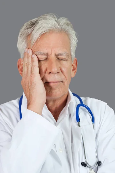 Senior Doctor Suffering Headache Gray Background — Stock Photo, Image