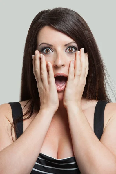 Portrait Shocked Young Woman Hands Face Gray Background — Stock Photo, Image