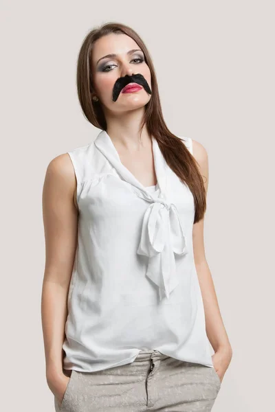 Portrait Beautiful Young Woman Fake Mustache Gray Background — Stock Photo, Image