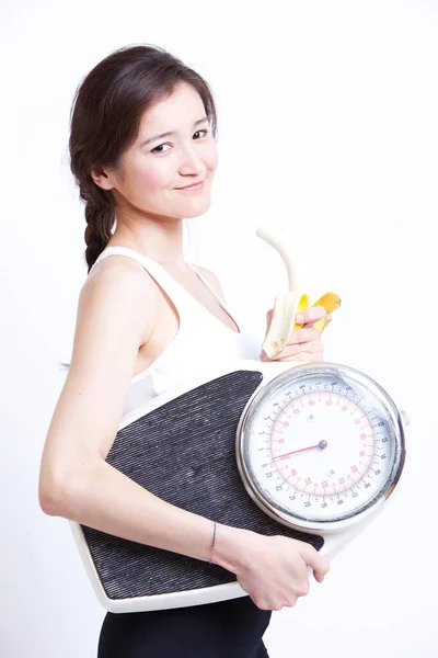 Side View Young Asian Woman Holding Banana Weight Scale White — Stock Photo, Image