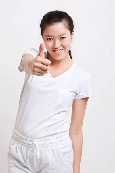 亚洲年轻女子在白种人背景下竖起大拇指的画像 — 图库照片