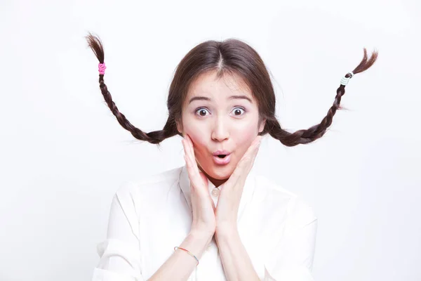 Portrait Surprised Young Woman Braids Curling Upwards White Background — Stock Photo, Image