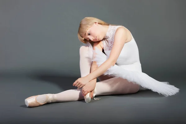 Upset Young Female Ballet Dancer Sitting Grey Background — Stock Photo, Image