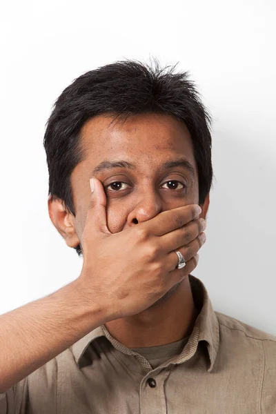 Portrait Young Indian Man Covering His Mouth White Background — Stock Photo, Image