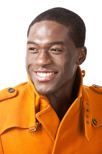 Szczęśliwy Młody Człowiek Pomarańczowym Płaszczu Okop Uśmiecha Się Białym Tle — Zdjęcie stockowe
