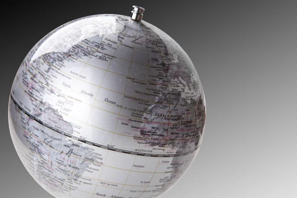 Close Silver Globe Gray Background — Stock Photo, Image