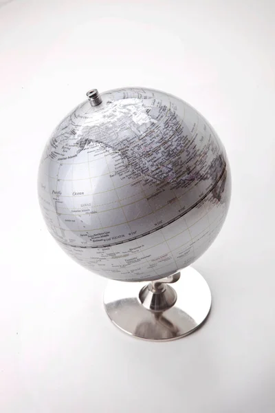 Close Silver Globe White Background — Stock Photo, Image