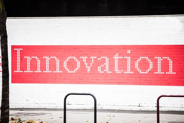 Innovation\' written on wall on background