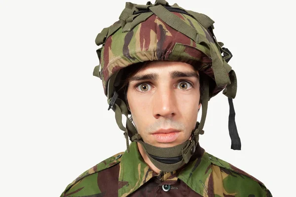 Close Portrait Young Soldier Staring Gray Background — Stock Photo, Image