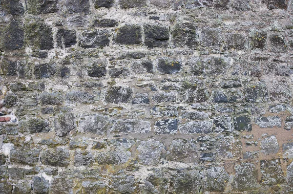Biraz Yosunlu Eski Taş Duvar — Stok fotoğraf