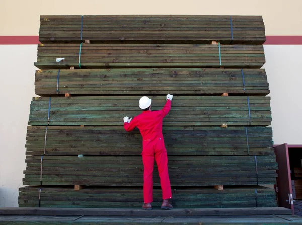 Hispanic Worker Inspecting Timber Wooden Planks — Stock Photo, Image