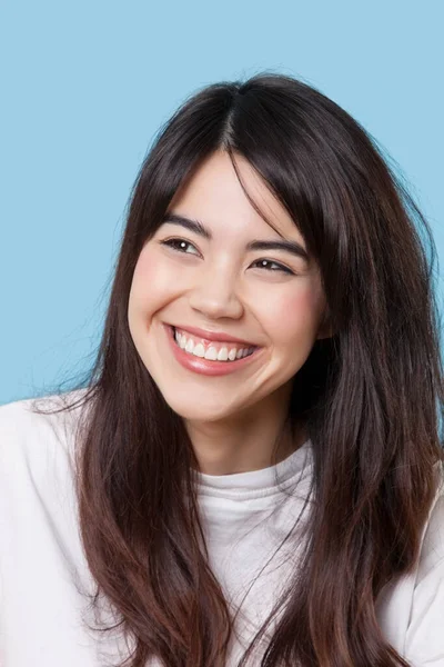 Close Happy Young Woman Looking Away Blue Background — Stock Photo, Image