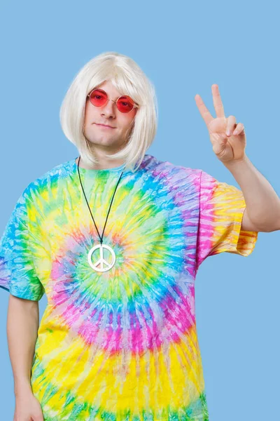 Portrait Funky Young Man Gesturing Peace Sign Blue Background — Stock Photo, Image