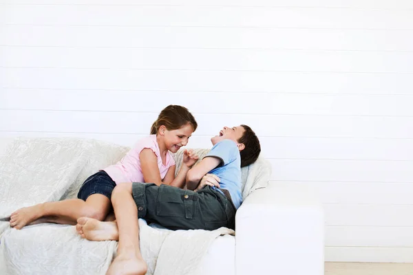 Brother Sister Relaxing Sofa Together — Stock Photo, Image