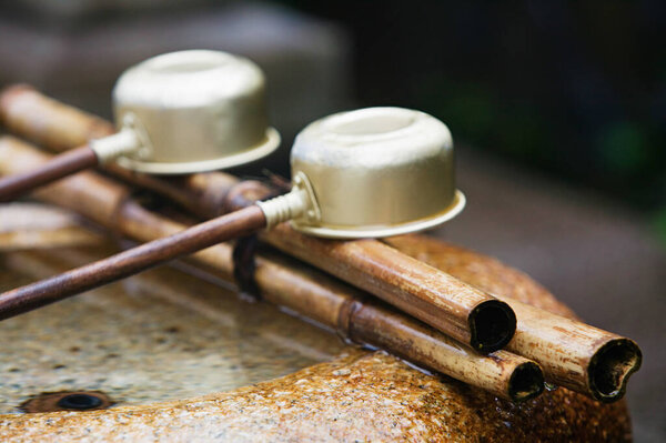 Row of Japanese ladles on background, close up