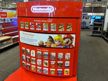 Honolulu - 7 Mart 2018: Nintendo eshop kartları, Oyunlar ve Dlc Donkey Kong, Prenses Toadstool ve en iyi satın almak içinde stok Mario ikonik karakterlerine sahip ekran. 