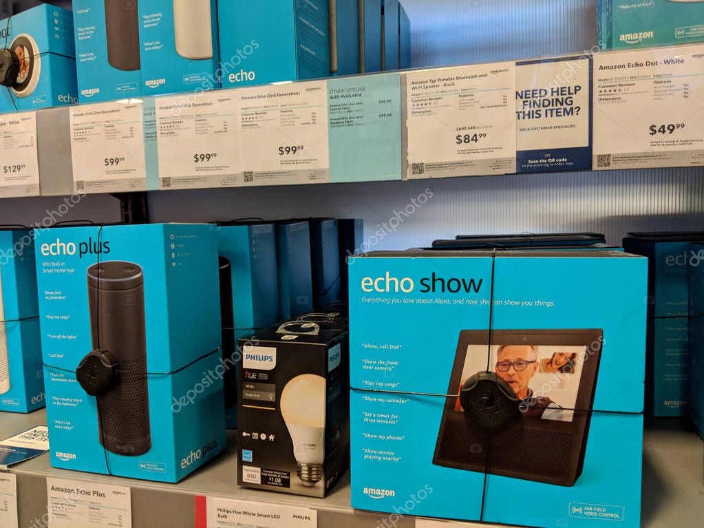 Honolulu - July 8, 2018:  Echo Show, Phillips Hue and Echo Plus on Display at Best Buy.  Amazon Echo Show and Spot is a smart speaker that is part of the Amazon Echo line of products. Similarly to other devices in the family, it is designed around Am