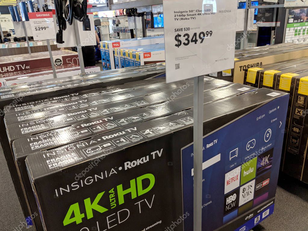 Honolulu - May 29, 2018:  TCL and Insignia Roku TVs on display at Best Buy. The Roku Streaming Player, or simply Roku, is a series of streaming players manufactured by Roku, Inc. Roku partners provide over-the-top content in the form of channels.