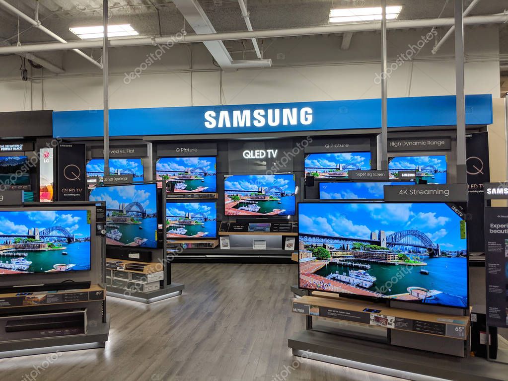 Fox Hills, Culver City, California -  October 25, 2018:  Samsung Logo and QLED TV inside Best Buy Store.  Samsung is a South Korean multinational conglomerate headquartered in Samsung Town, Seoul. It comprises numerous affiliated businesses, most of