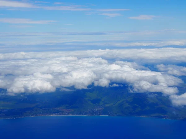 Aerial of West Oahu, Clouds, and Ocean on a beautiful day.
