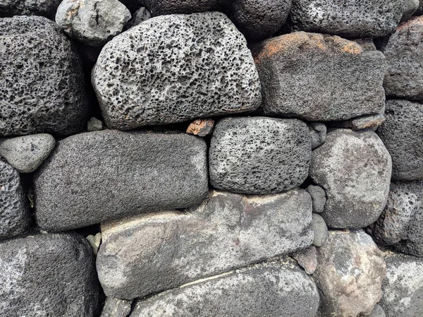 Primer plano de una antigua pared de piedra de lava —  Fotos de Stock