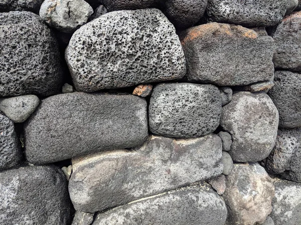 Primer plano de una antigua pared de piedra de lava — Foto de Stock