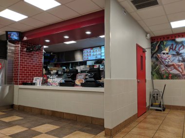Menu, Order Registers, and Hawaii Mural inside Jack in the Box R clipart