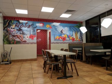 Box Restaurant 'ta Jack içinde masalar ve Hawaii mural