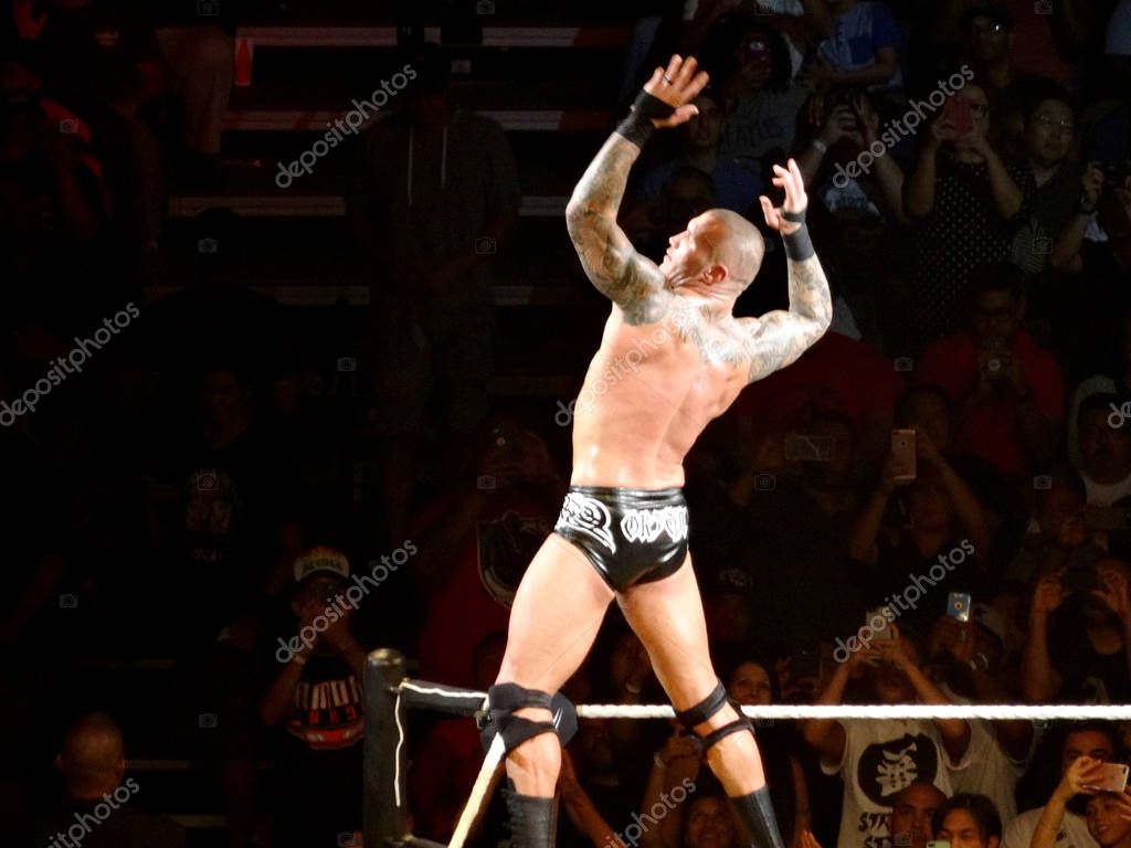 Honolulu - September 13, 2017: Close-up of WWE Wrestler Randy Orton does signature pose with arms held in the air in WWE ring at WWE event at the Neal S. Blaisdell Center, Honolulu on September 13, 2017.