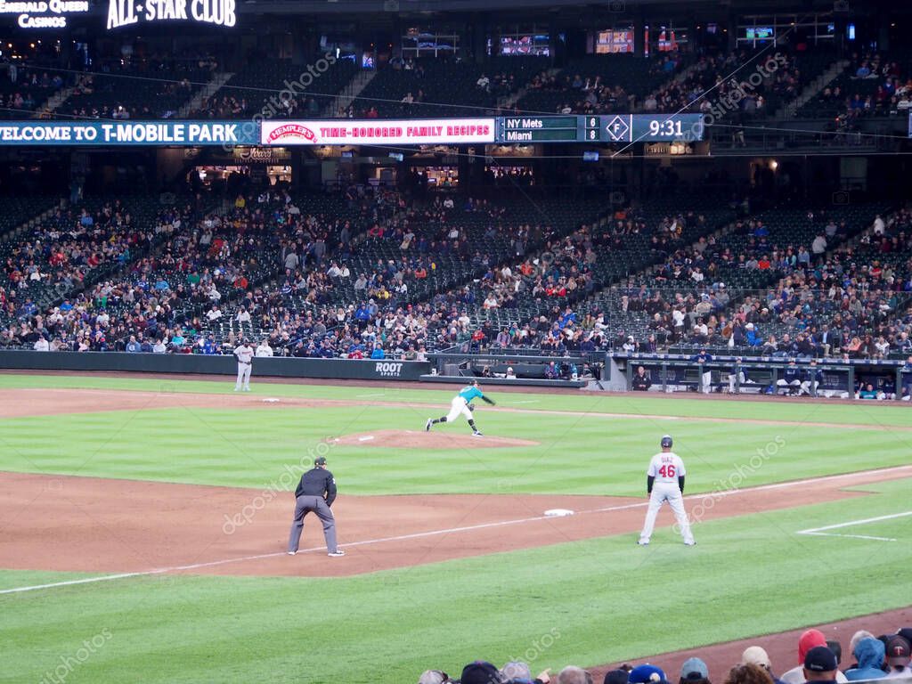 SEATTLE - May 18, 2019: Mariners Pitcher steps forward to throw pitch to batter during baseball game at Safeco Field, Seattle.