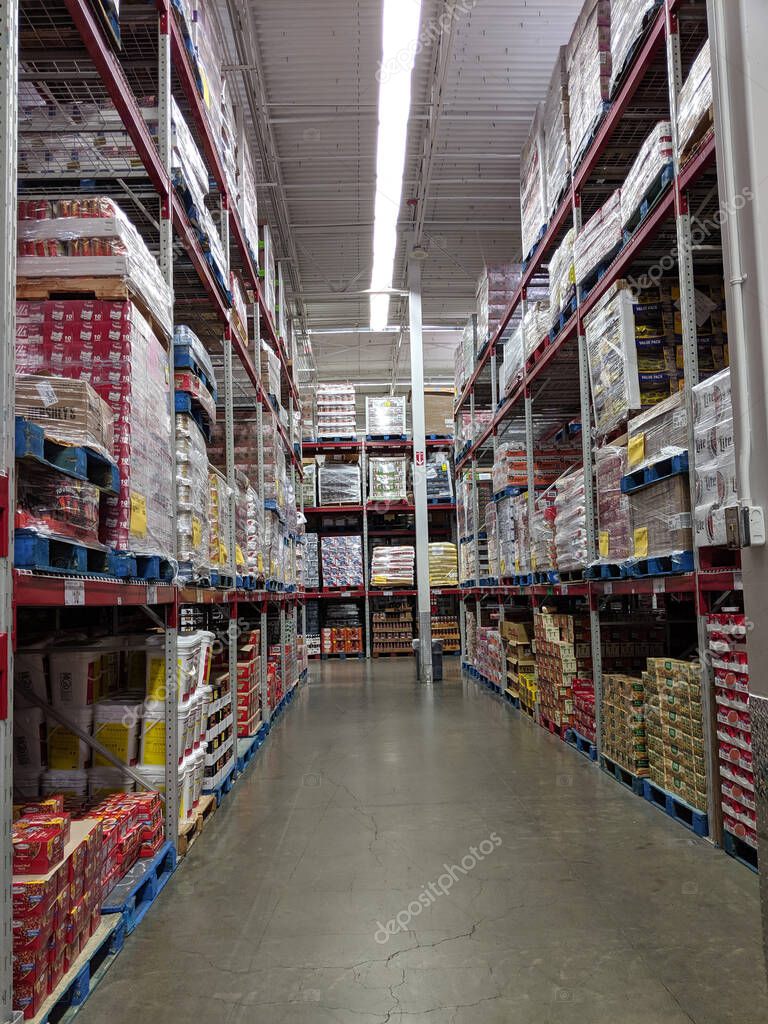 Honolulu - August 23, 2019:  Hallway of can goods items stacked to the ceiling inside Sam's Club.