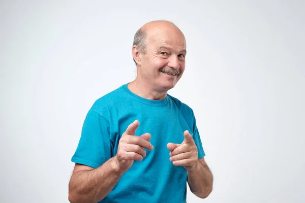 Excited Mature Man Blue Shirt Pointing Fingers Camera Isolated White — Stock Photo, Image