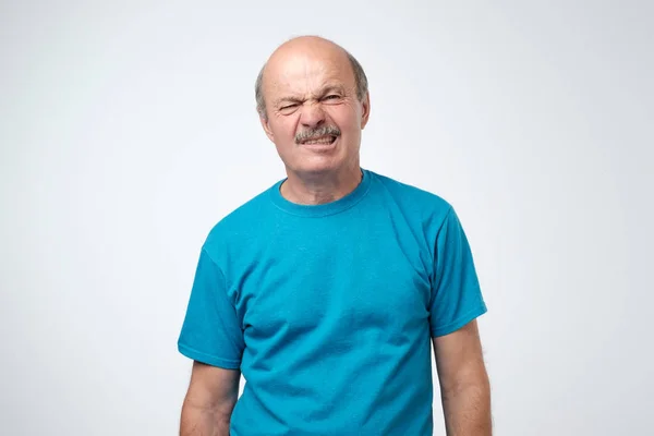 Shocked Mature Man Looking Something Unpleasant Bad Isolated Gray Background — Stock Photo, Image