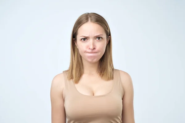 Portrait Puzzled Woman Looking Big Opened Eyes Camera Biting Her — Stock Photo, Image