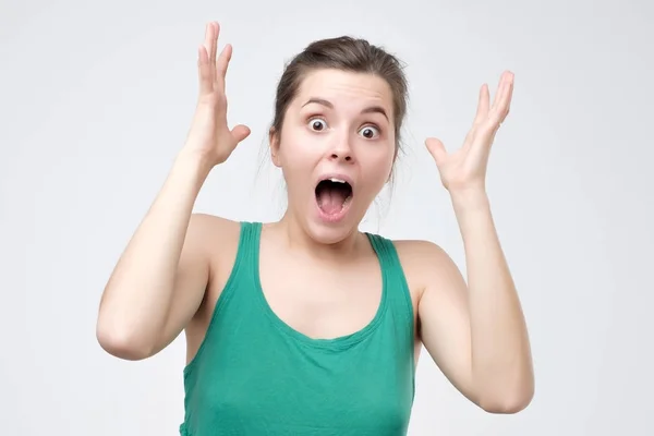 Surprised Young Woman Green Clothes Shouting Shocked Great News Looking — Stock Photo, Image