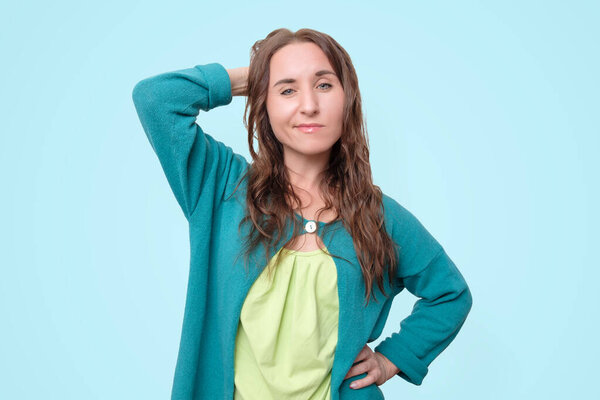 Thinking woman looking up trying to make a decision.