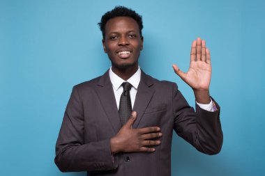 African american man making a loyalty promise oath clipart