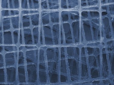 Anlamlı soyut mavi ızgara yapısı. Dinamik ızgara yapısıile mavi renkli soyut arka plan.