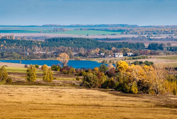 Panoramic view to the river near the village at the hills as background, Mari El, Russia